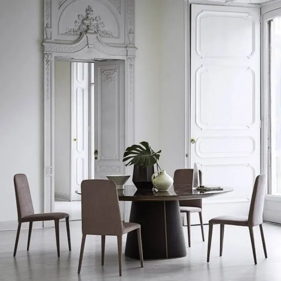 Distinguished Frag Artù dining table crafted in Italy with a satin medium-brown wood tabletop and dark leather-upholstered base