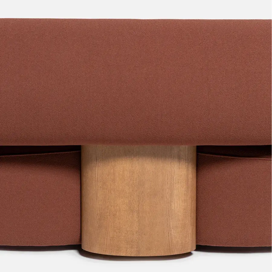 Superior Carpanese Home Slow sectional with reddish-brown textile upholstery and satin-finish light-toned ash wood legs