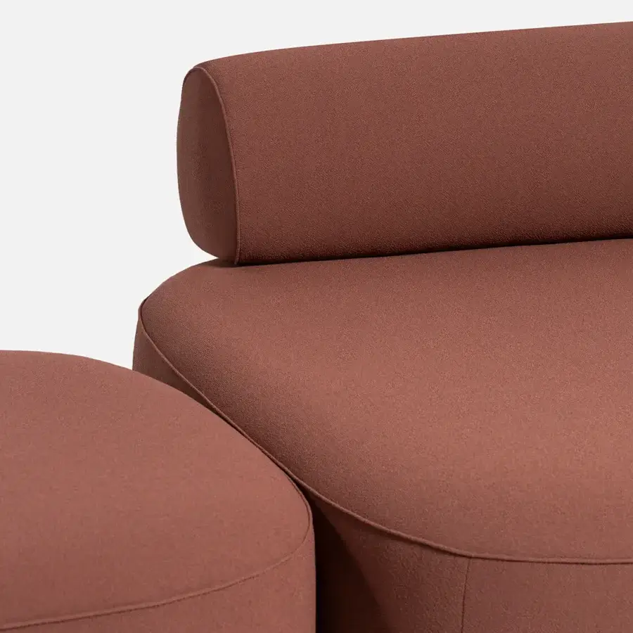 Lavish Carpanese Home Slow sectional with muted terracotta textile upholstery and exposed ash wood supports