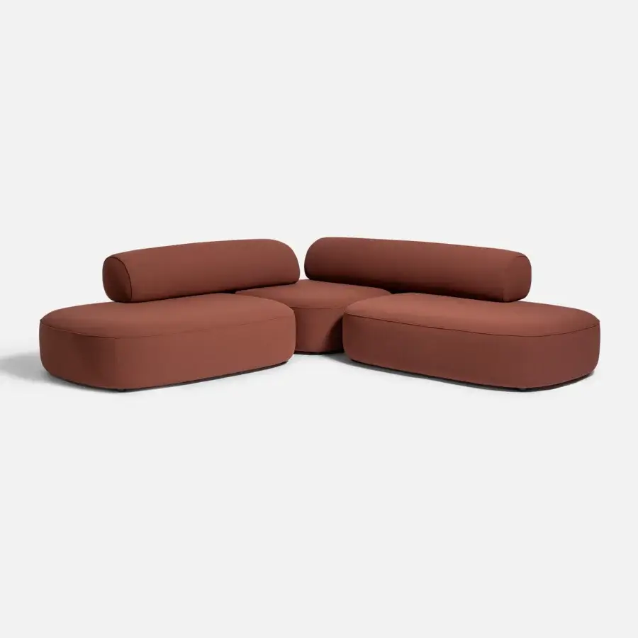 Elegant Carpanese Home Slow sectional with muted terracotta textile upholstery and exposed ash wood support