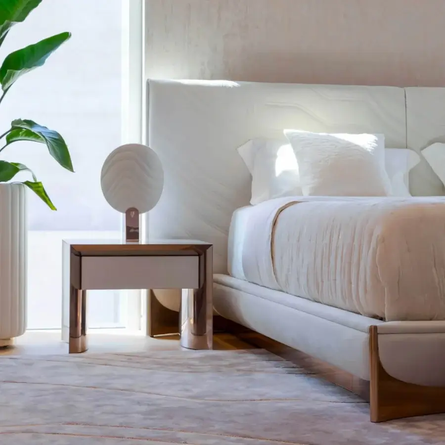 Elegant Visionnaire Ca' Foscari nightstand with a concave silhouette and hand-polished glossy muted bronze lacquer finish