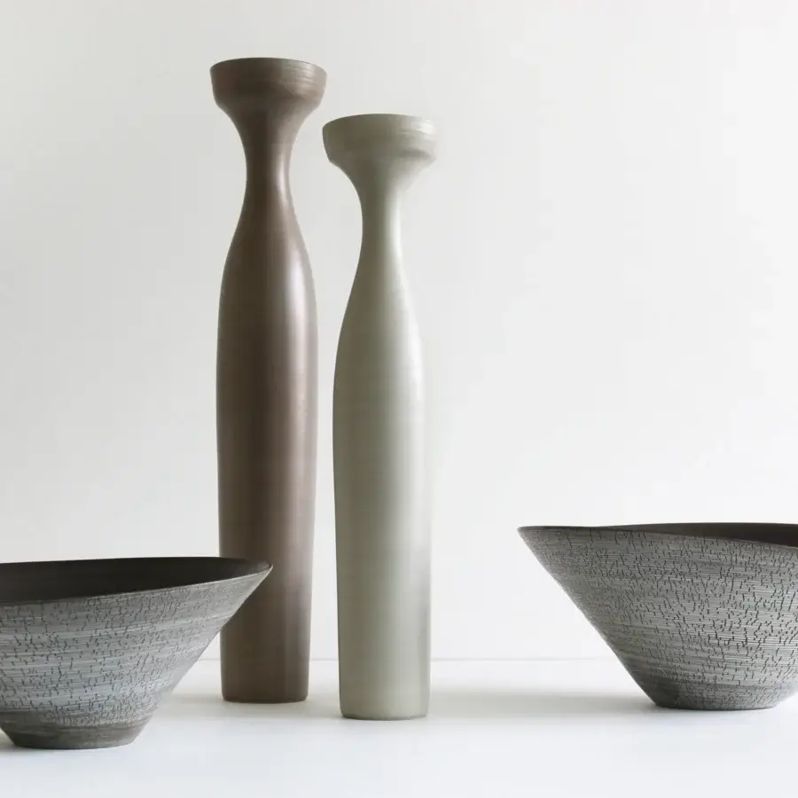 Exclusive Rina Menardi Campanelle centerpiece crafted in baked clay with warm brown, grey and charcoal tones plus a matte finish