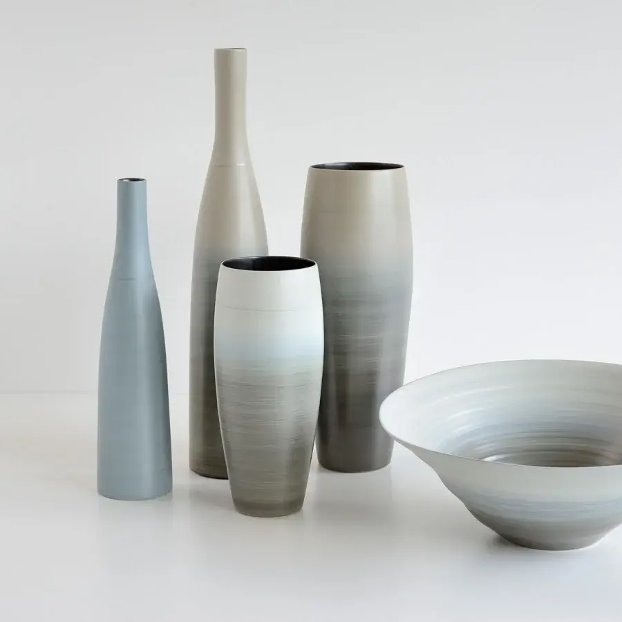 Distinguished Rina Menardi Campanelle centerpiece crafted in baked clay with satin finish and subtle vertical brushstroke markings