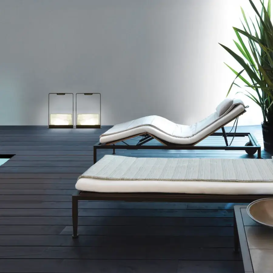 Sophisticated Giorgetti Gea lounger crafted with carob powder-coated aluminum and comfortable white Breathair® cushioning