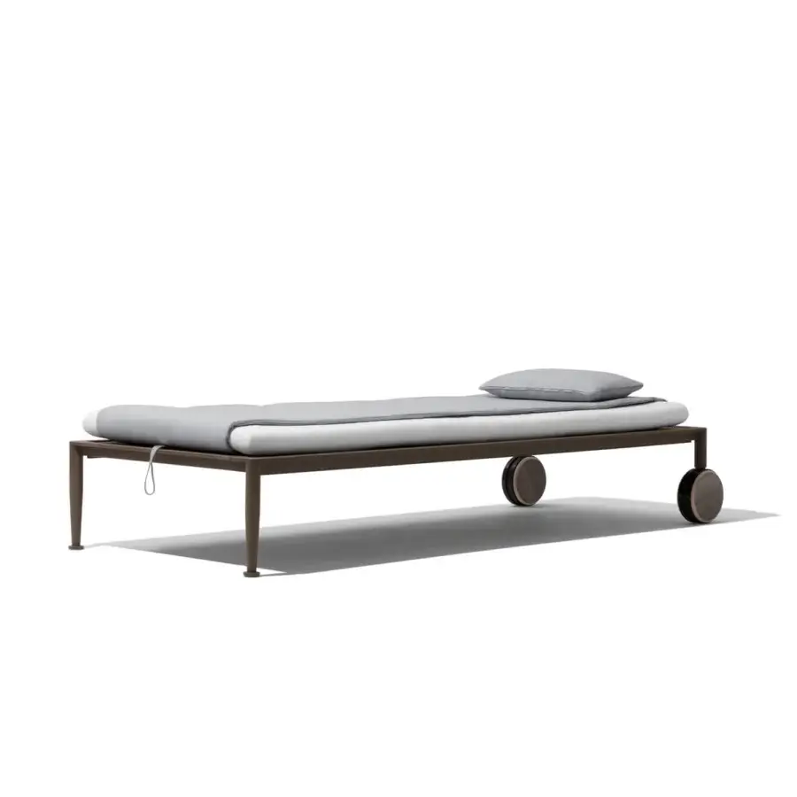 Luxury Giorgetti Gea lounger crafted with carob powder-coated aluminum and breathable muted gray Breathair® cushion