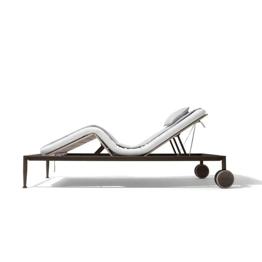 Distinguished Giorgetti Gea lounger crafted with carob powder-coated aluminum and breathable light beige cushioning
