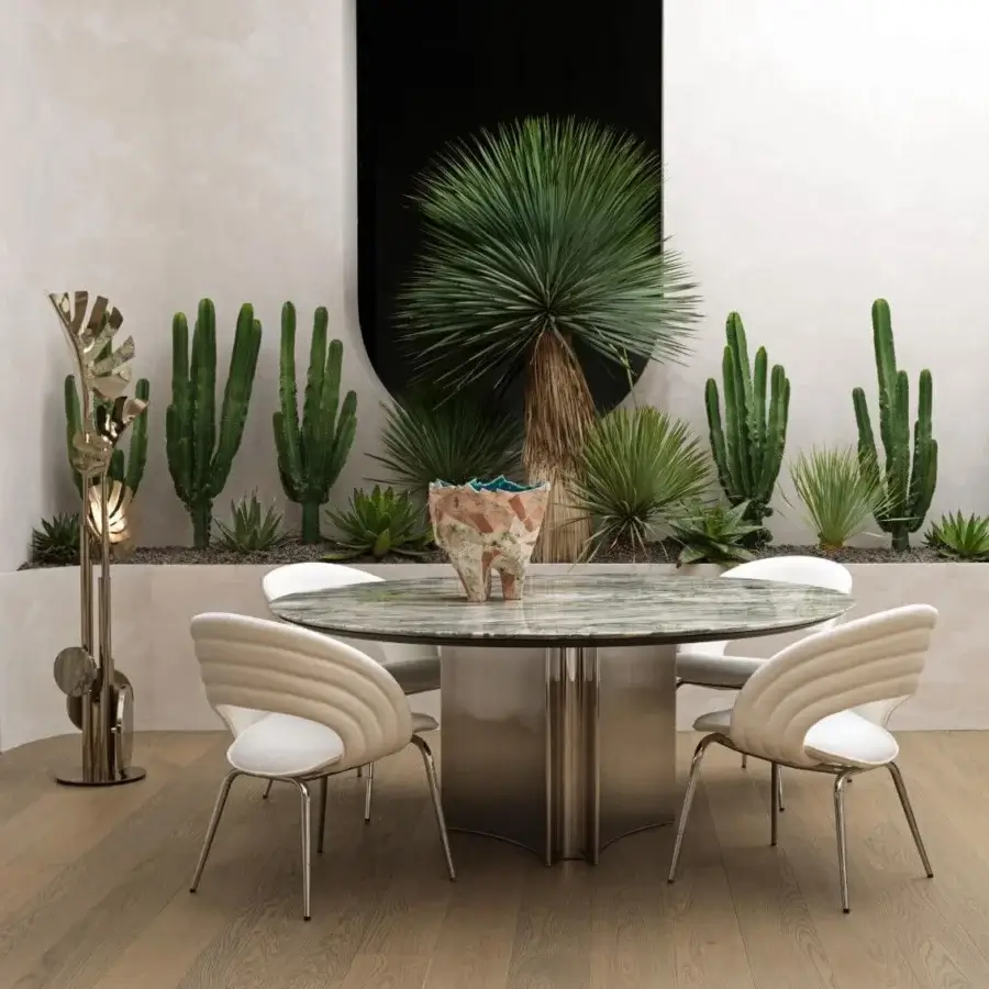 Architectural Visionnaire Kerwan Outdoor table crafted in Italy with green and white veined marble tabletop and hand-polished 316 stainless steel base