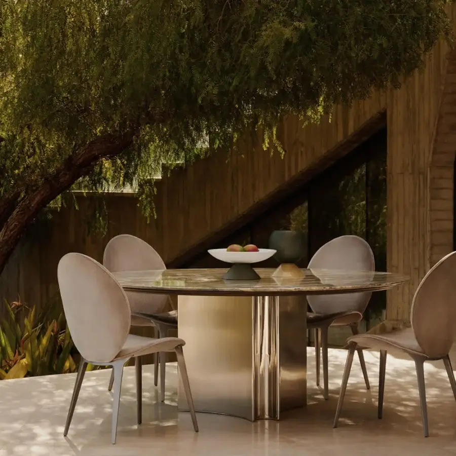 Superior Visionnaire Kerwan Outdoor table crafted in Italy with dark grey mottled marble and hand-polished stainless steel base