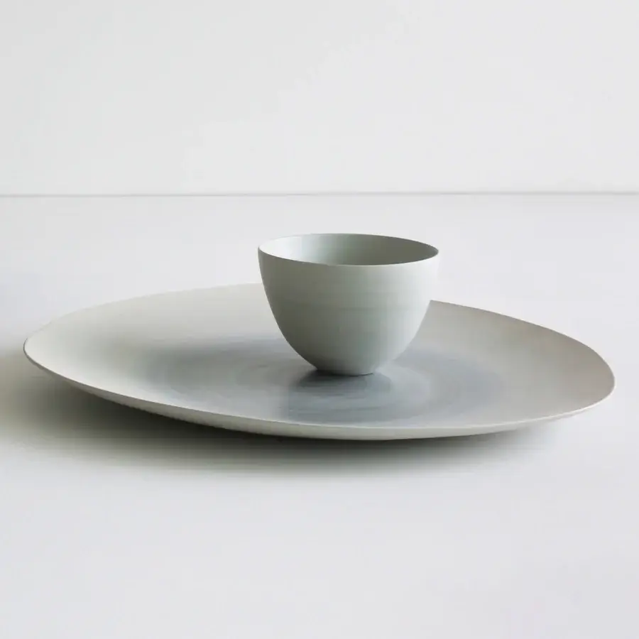 Distinguished Rina Menardi Ciotole bowls crafted in Italy from baked clay with a soft matte finish