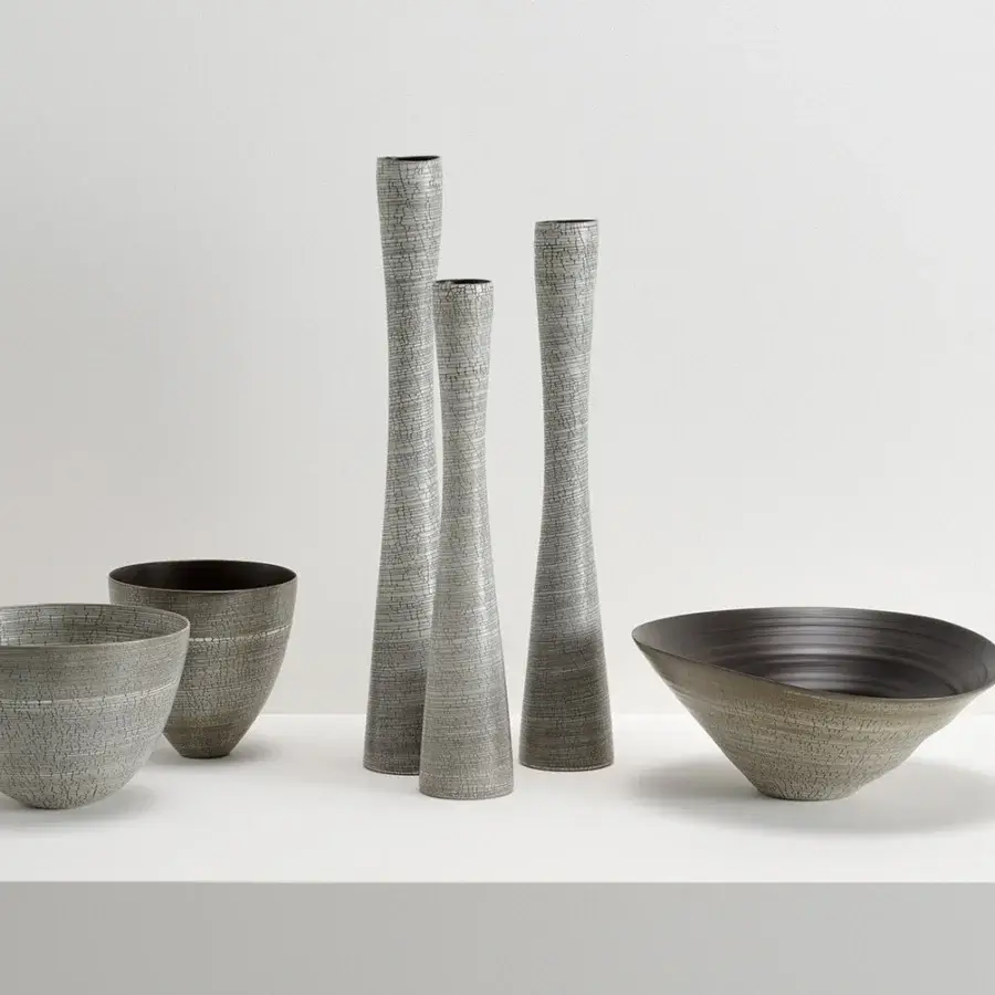 Distinguished Rina Menardi Ciotole bowls crafted from baked clay with a muted gray and subtly mottled texture