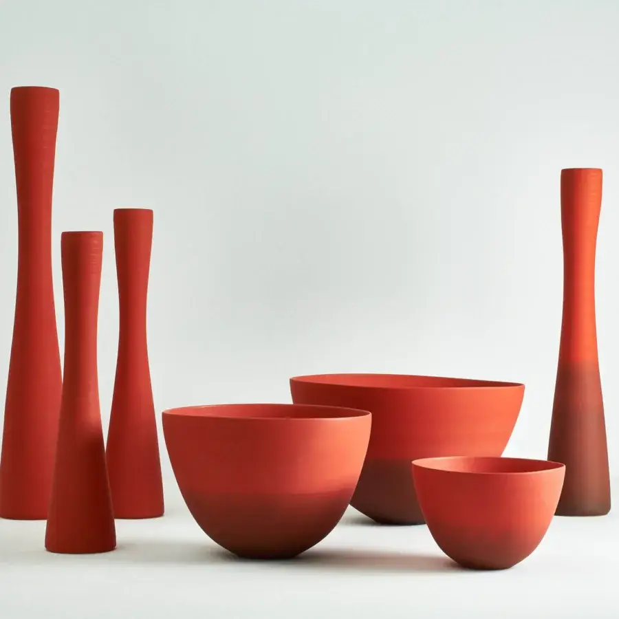 Superior Rina Menardi Ciotole bowls crafted from baked clay in a warm reddish-brown tone with subtle tonal variations