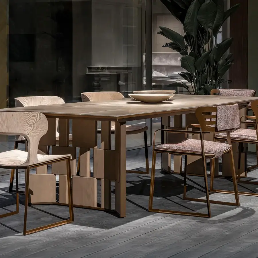 Superior Giorgetti Break table with Etna lava stone inserts, ash wood legs and carob powder-coated metal accents