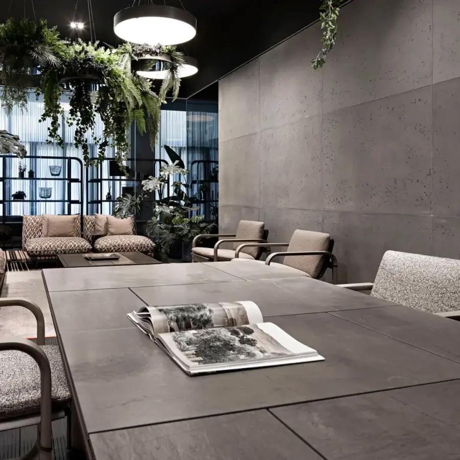 Elegant Giorgetti Break table with Etna lava stone, warm ash wood, and carob powder-coated aluminium structure
