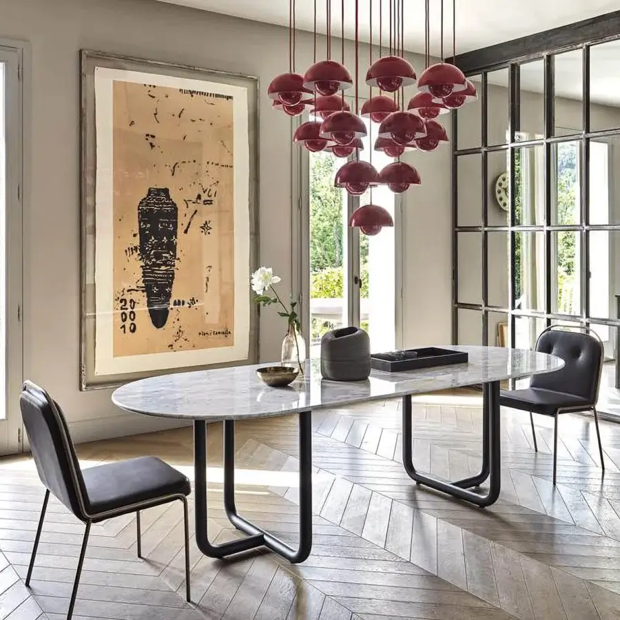 Superior Dainelli Studio Frag Paipu dining table with an elongated marble top and matte black steel base crafted in Italy