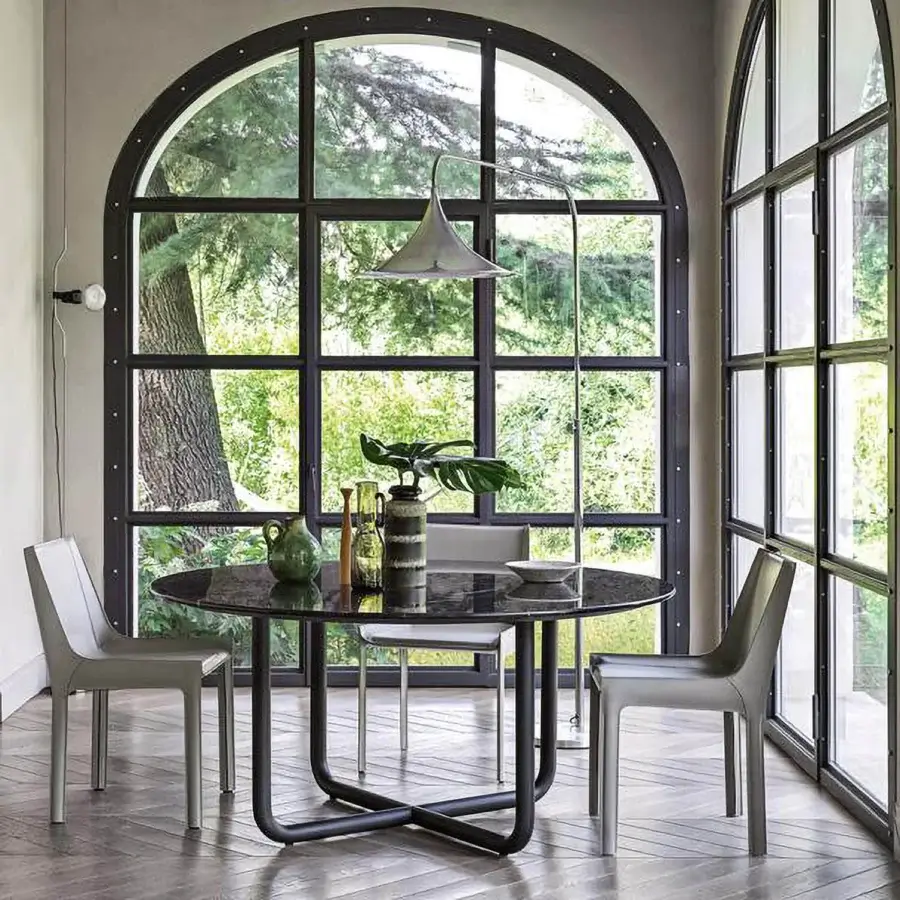 Distinguished Dainelli Studio Frag Paipu dining table with glossy marble and curved matte grey steel tubes inspired by 1970s design