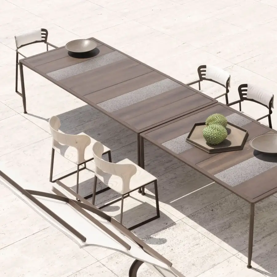 Distinguished Giorgetti Gea table crafted with carob aluminum, stone oak, and Etna lava stone surfaces exhibiting a contemporary finish