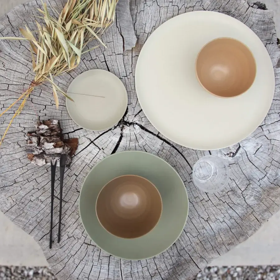 Exceptional Rina Menardi Ciotole bowls crafted from baked clay with a creamy off-white hue and matte finish
