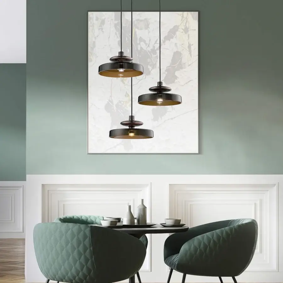 Innovative Vistosi Tread suspension lamp crafted in metal with matte black exterior and gold-toned interior finish