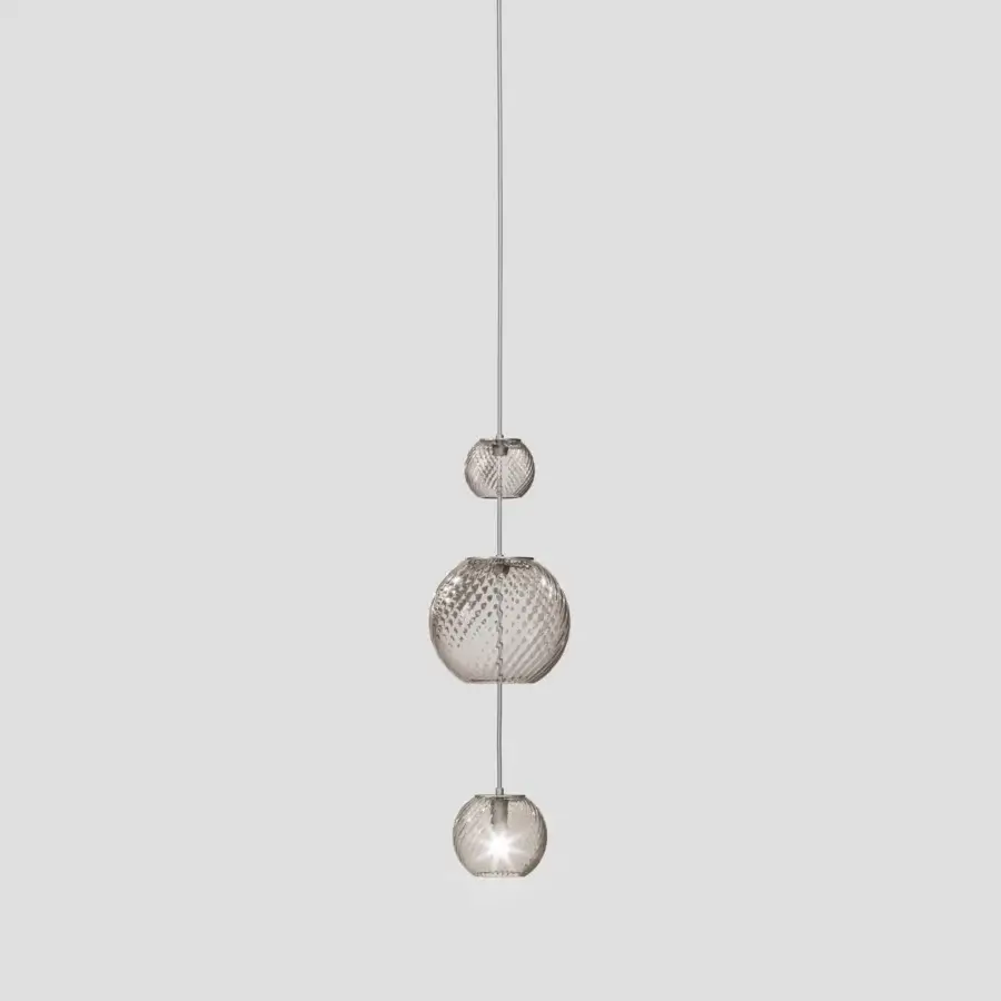 Superior Vistosi Oto suspension lamp crafted in pale amber Murano glass with a signature rigadin finish and silver-grey metal cable