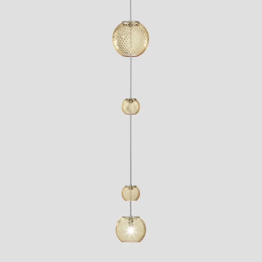 Elegant Vistosi Oto suspension lamp crafted in amber Murano glass with a distinctive rigadin finish creating a golden-yellow glow