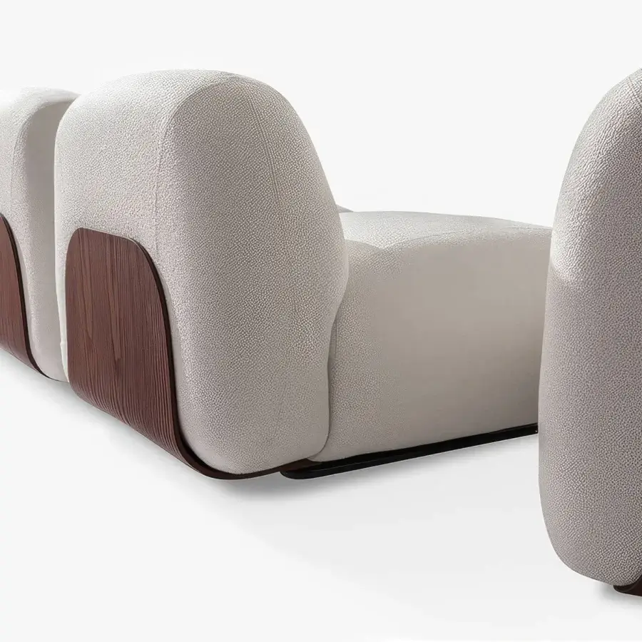 Distinguished Carpanese Home Bubble Sectional sofa upholstered in light neutral textile with a dark brown satin-finish curved wood base