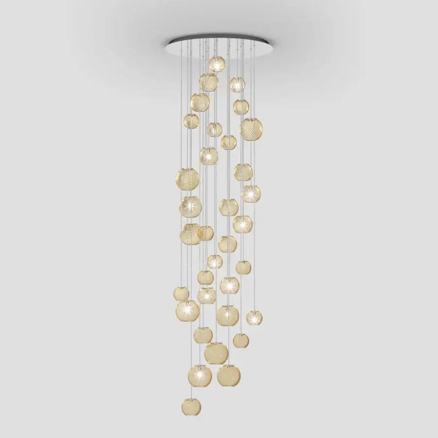 Distinguished Vistosi Oto suspension lamp crafted in golden-amber Murano glass with rigadin texture and neutral matte finish canopy