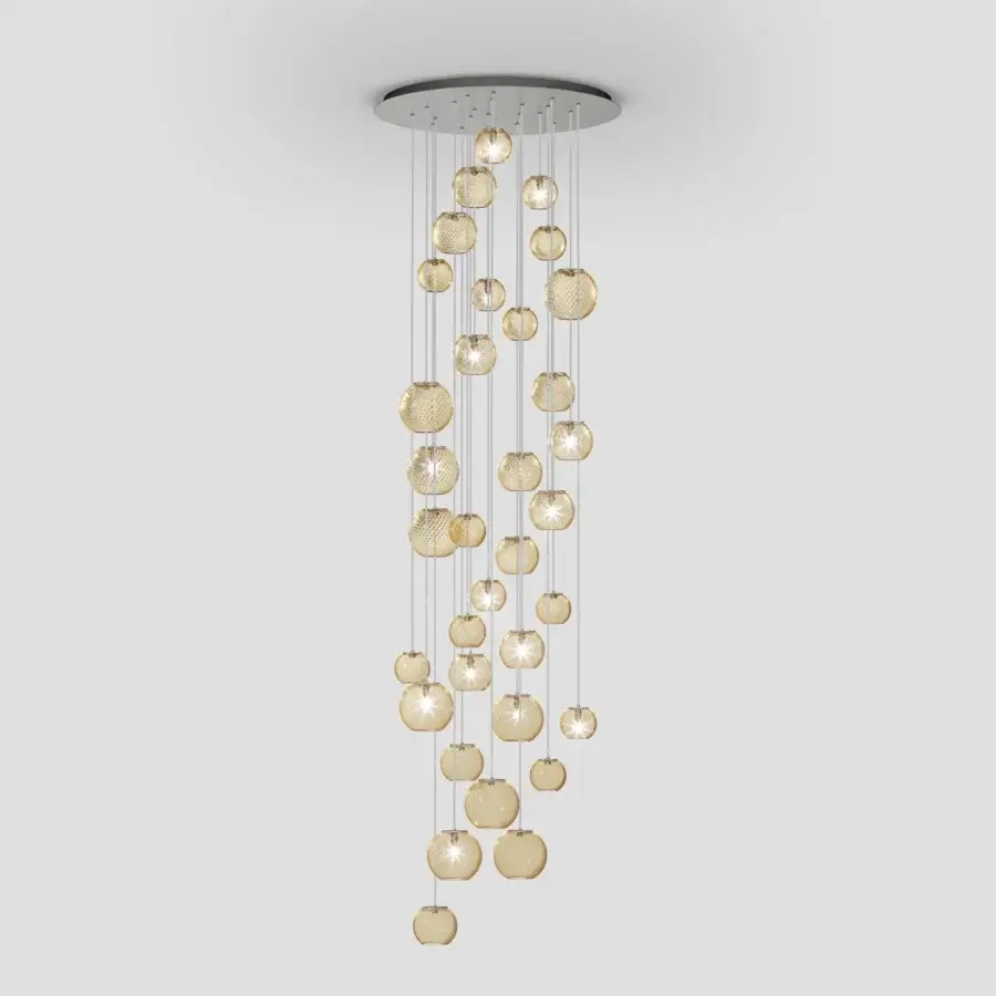 Exceptional Vistosi Oto suspension lamp crafted in warm golden amber Murano glass with captivating rigadin texture