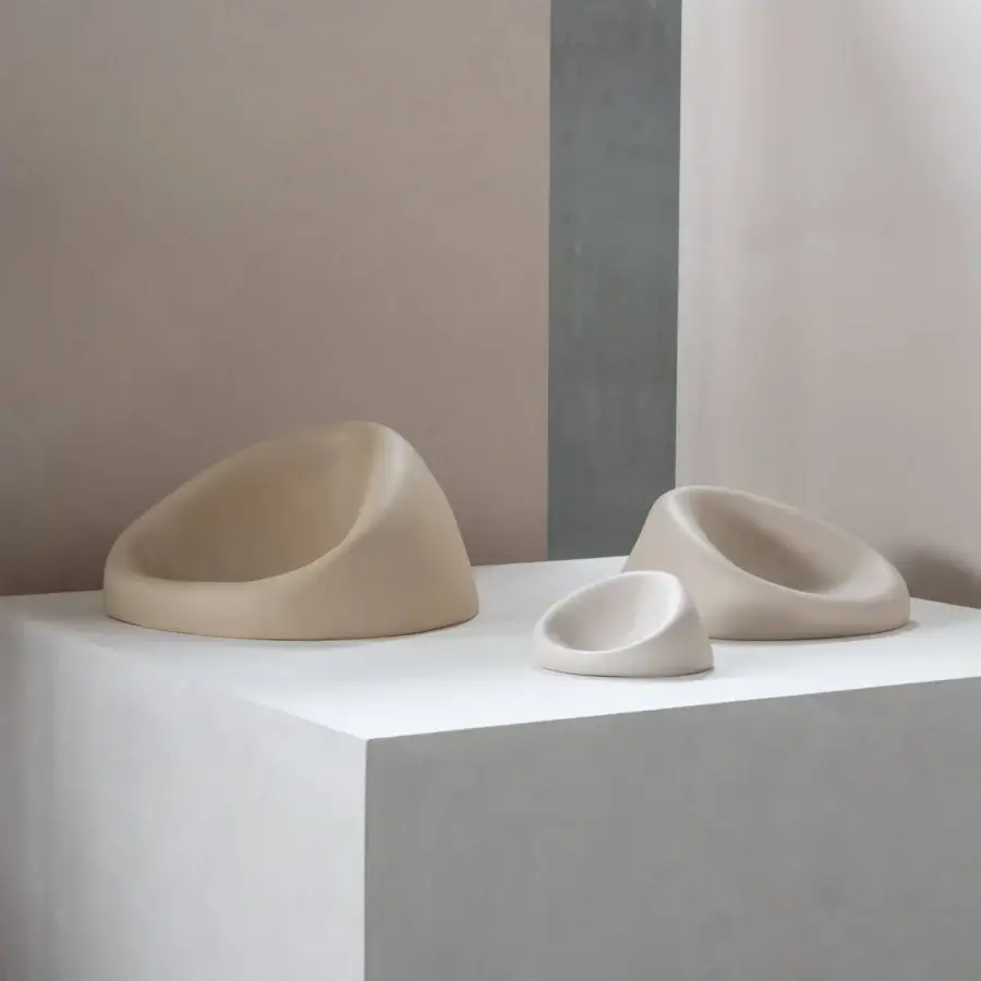 Superior Rina Menardi Clio centerpiece crafted in baked clay with a smooth matte finish and organic form