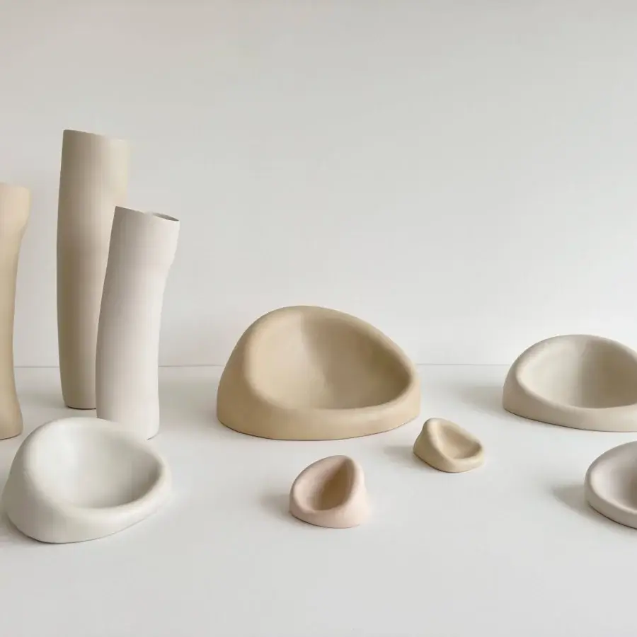 Exceptional Rina Menardi Clio centerpiece crafted in Italy from baked clay with a matte finish in warm beige and peach tones