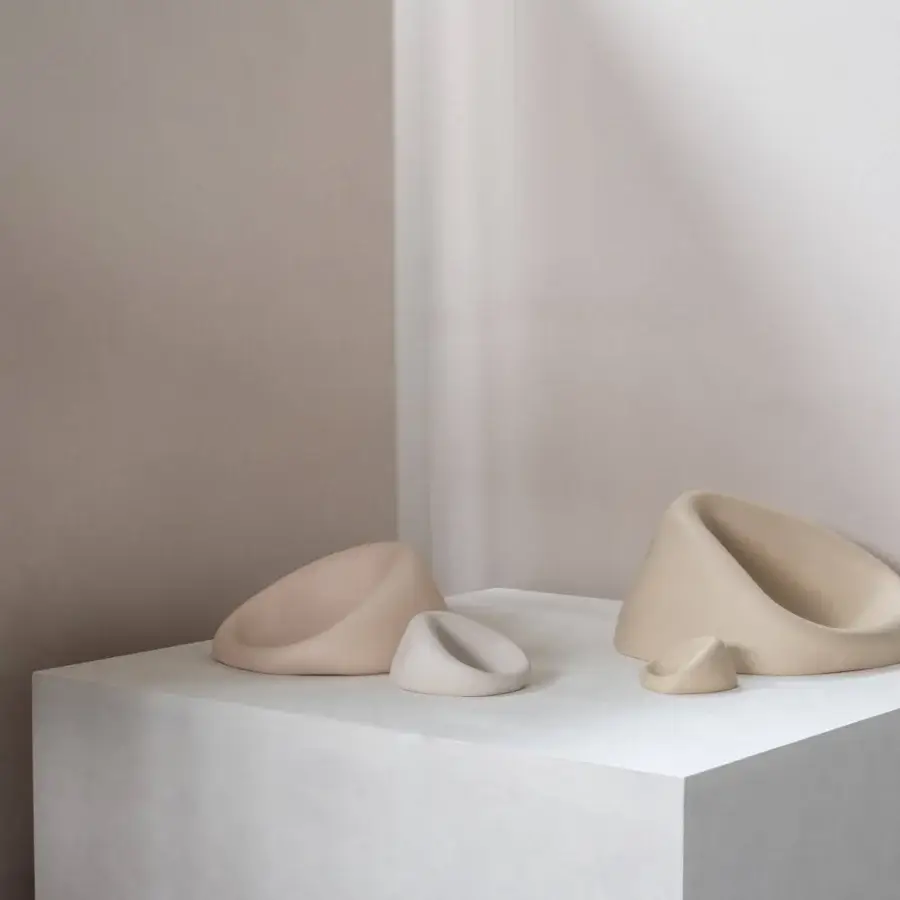 Distinguished Rina Menardi Clio centerpiece crafted in baked clay with organically curved forms and a pale beige finish