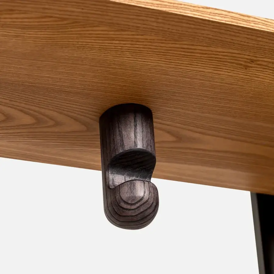 Distinguished Carpanese Home Paw valet stand crafted in ash wood with a black lacquered central element and golden finish