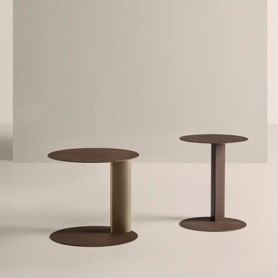 Distinguished Frag Bler side table crafted with steel and saddle leather, exhibiting a brushed finish and cylindrical form
