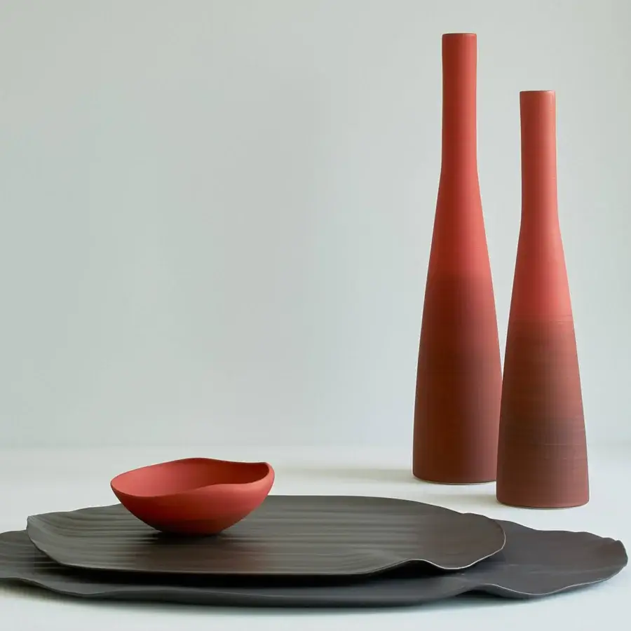 Exclusive Rina Menardi Conchiglie centerpiece crafted from baked clay in a muted terracotta tone with a contemporary aesthetic