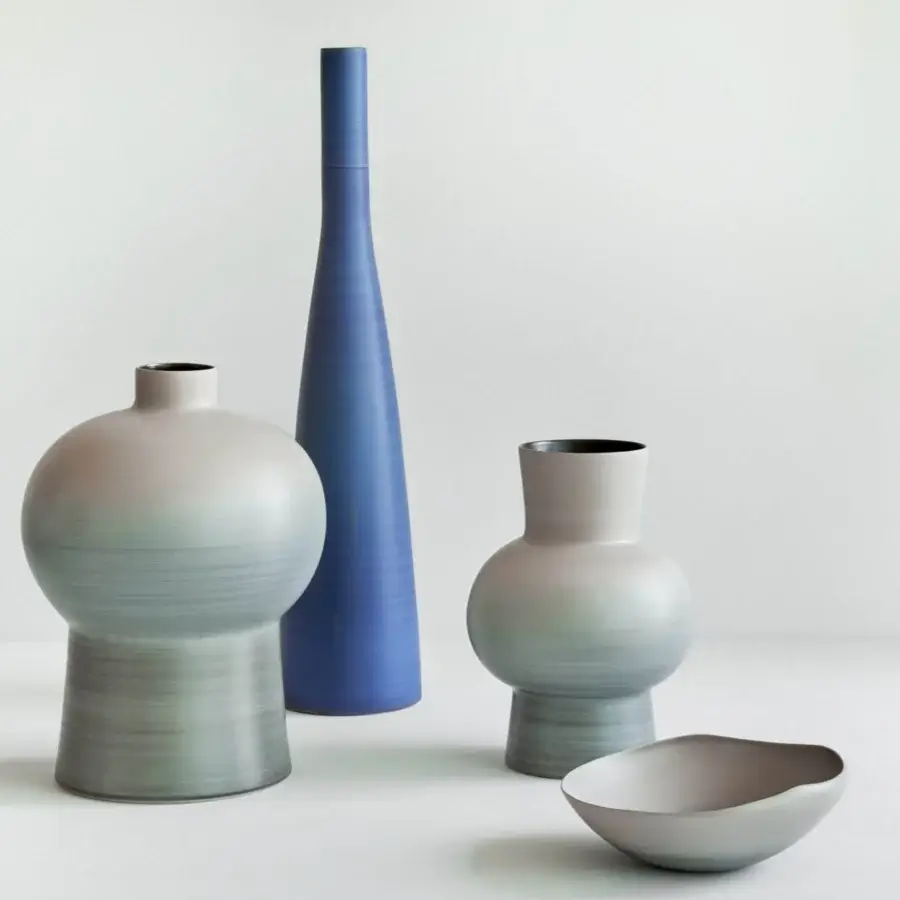 Distinguished Rina Menardi Conchiglie centerpiece crafted from baked clay with softly gradiented ceramic in muted blue-grey and matte finish