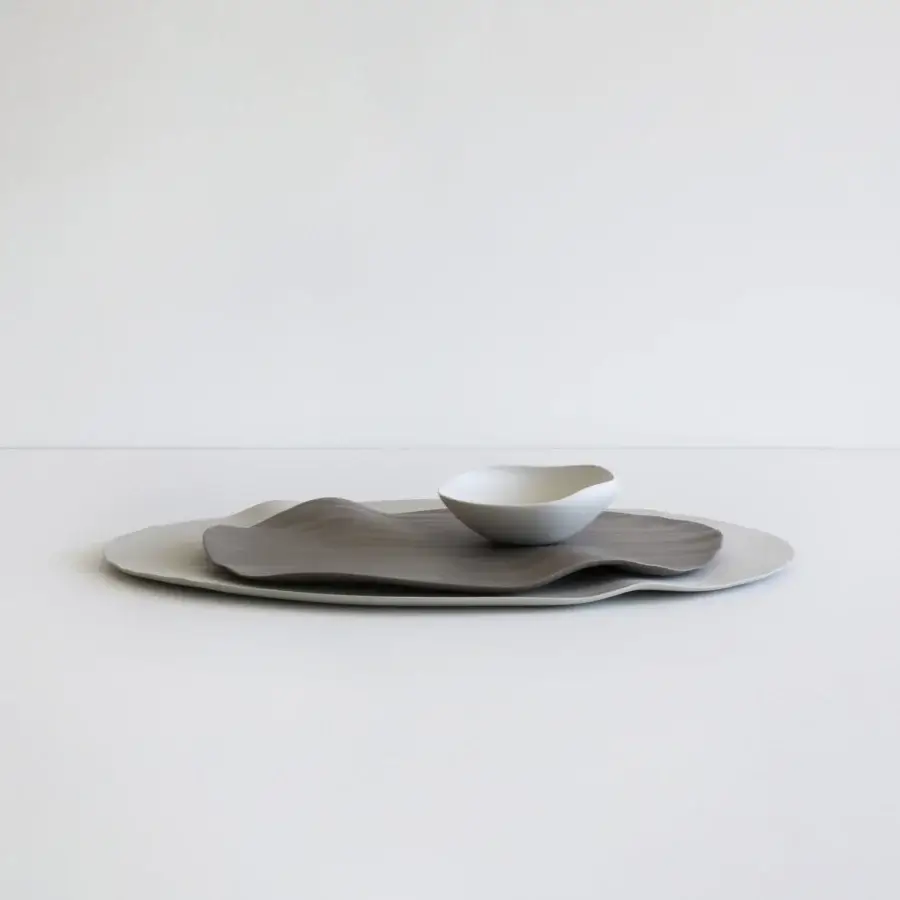 Superior Rina Menardi Conchiglie centerpiece crafted in baked clay with undulating forms and a smooth matte finish