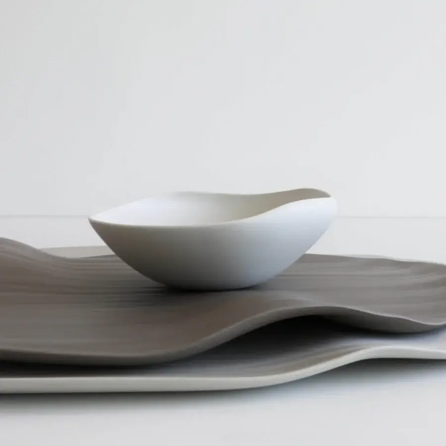 Distinguished Rina Menardi Conchiglie centerpiece crafted from baked clay with smooth matte white finish