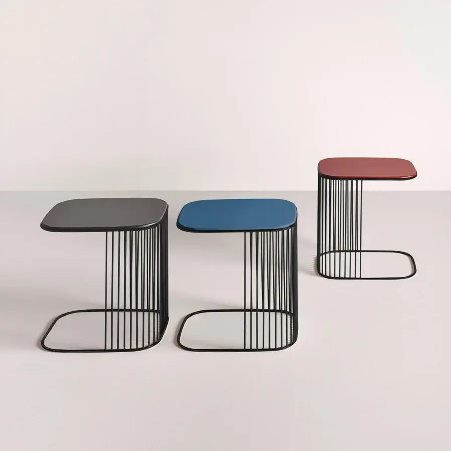 Distinguished Frag Comb side table with a matte dark gray rectangular tabletop and geometric wireframe base crafted in Italy