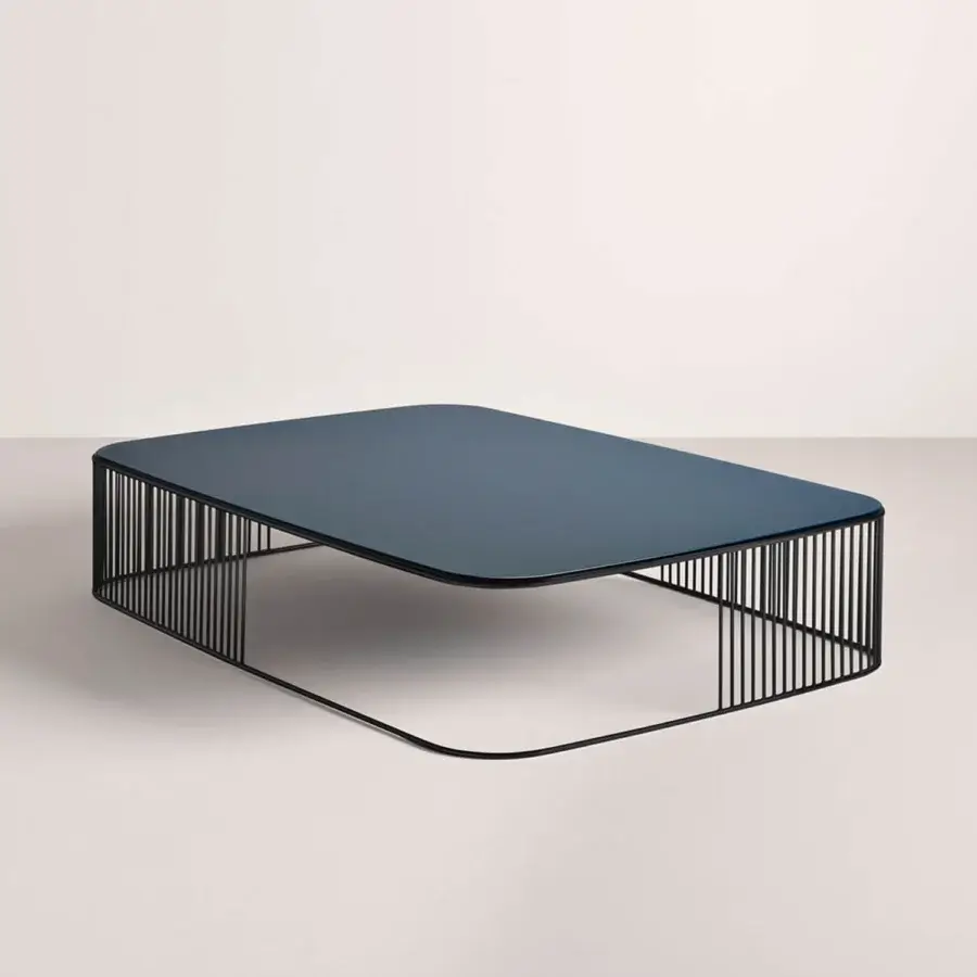 Distinguished Frag Comb coffee table with dark blue tinted glass top and sleek black metal frame in matte finish