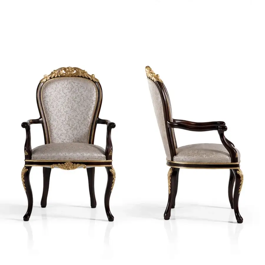 Exceptional Armando Rho A1169 & A1170 chair crafted in Italy with light beige floral textile and striking ebony finish with gold leaf accents