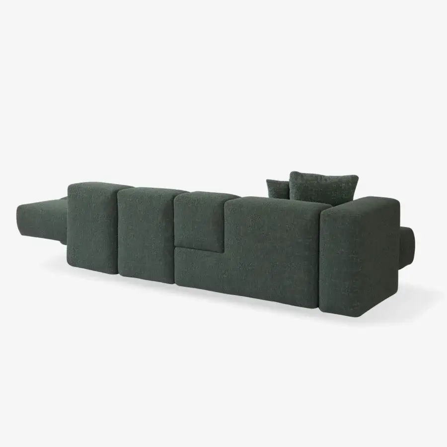Exclusive Carpanese Home Cusco sofa with geometric volumes upholstered in textured muted dark green fabric and EPA certified plywood construction
