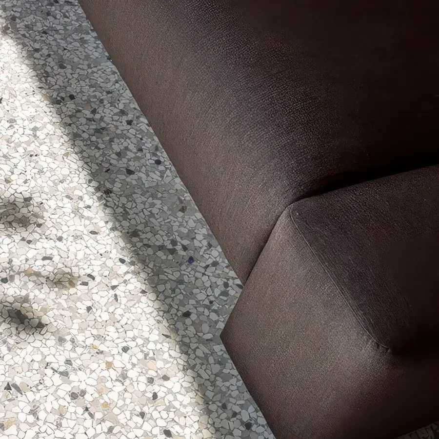Exceptional Carpanese Home Cusco sofa with a low geometric profile upholstered in textured dark chocolate fabric built with a plywood frame