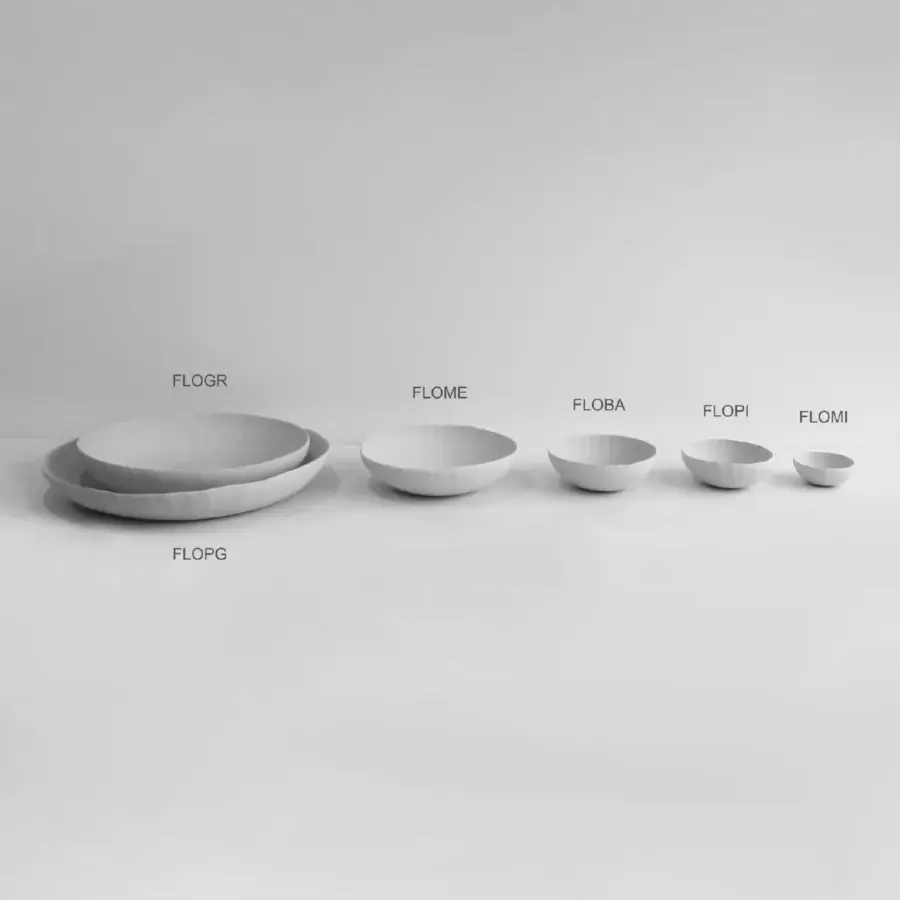 Distinguished Rina Menardi Fiori centerpiece crafted in baked clay with gently curved organic forms and a matte finish