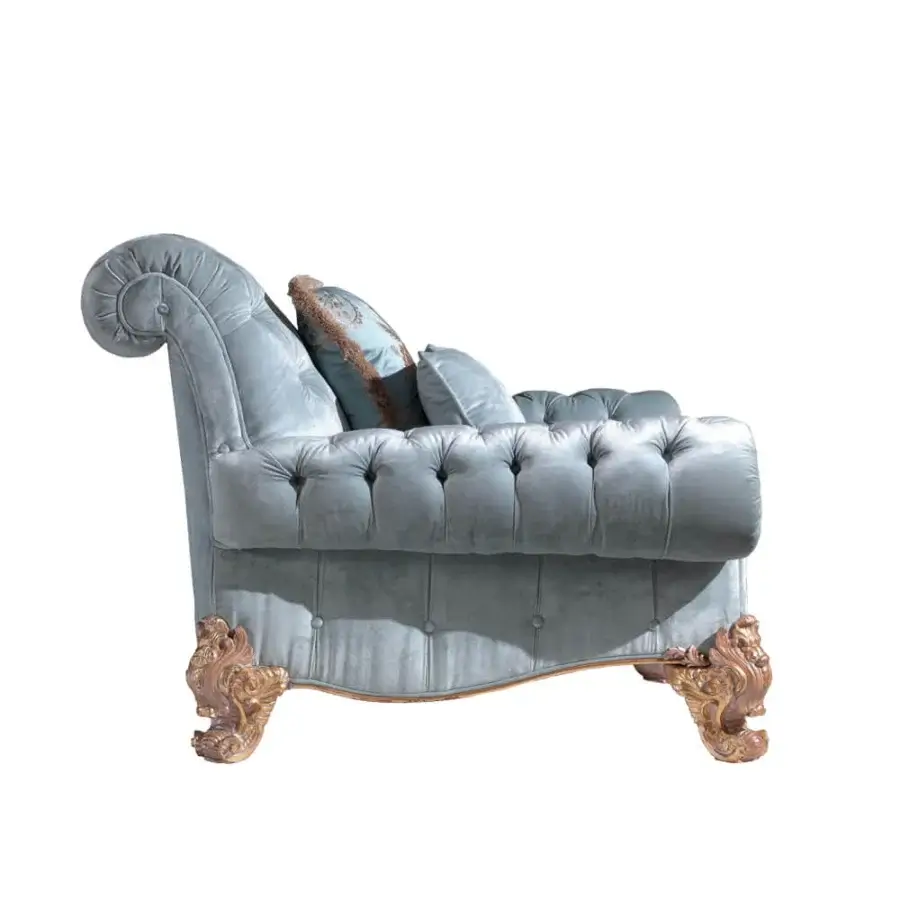 Lavish Armando Rho A1233 lounge chair upholstered in textured dusty blue textile with ornate gold detailing