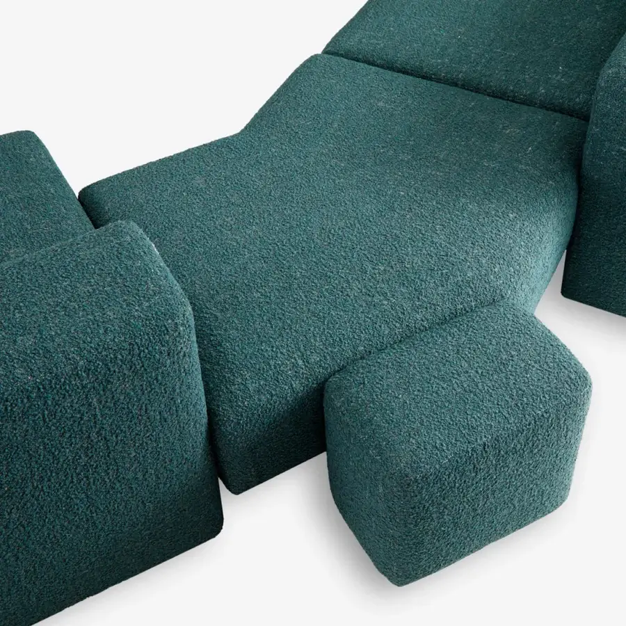 Refined Carpanese Home Cusco sectional upholstered in deeply textured teal fabric with an Italian crafted frame