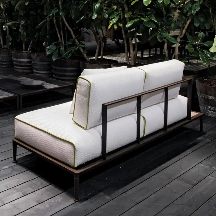 Exceptional Giorgetti Gea sofa with a carob powder-coated aluminum frame and textured white textile upholstery accented with lime green piping