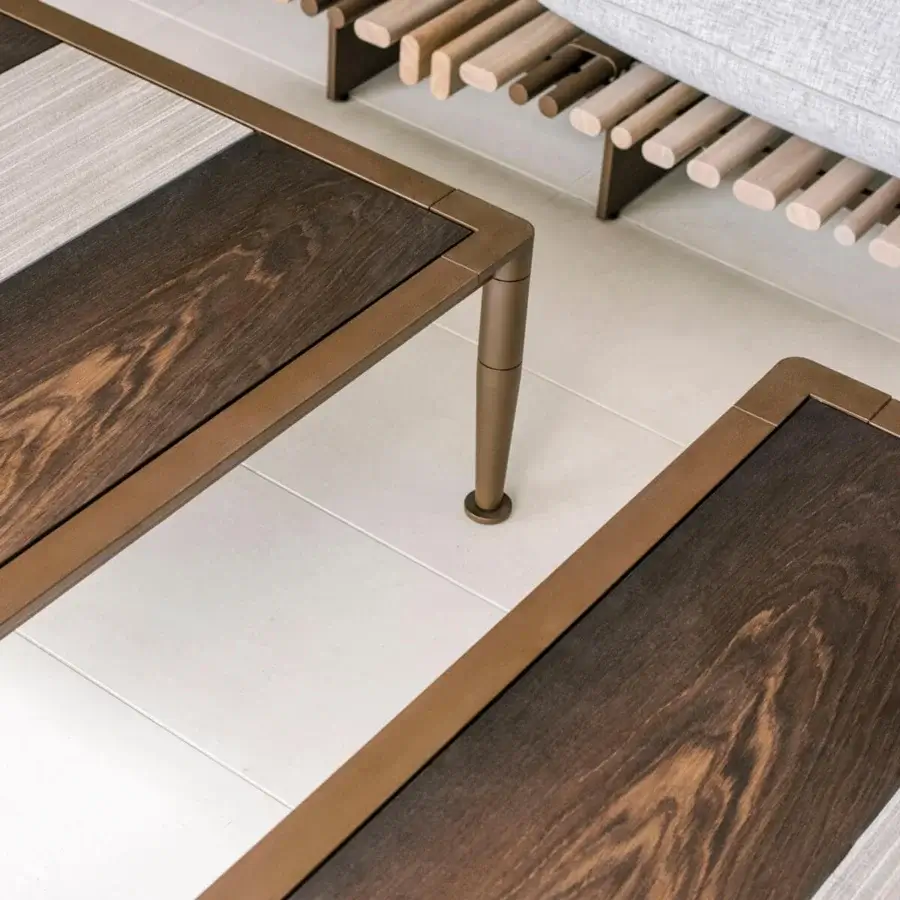 Refined Giorgetti Gea coffee table with warm carob powder-coated aluminum and satin Stone Oak tabletop