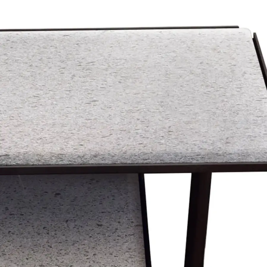 Elegant Giorgetti Apsara side table with charcoal steel frame and muted gray Etna lava stone top