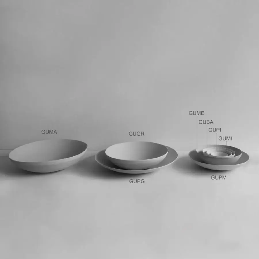 Superior Rina Menardi Gusci Shells centerpiece crafted in matte ceramic with organic curved forms and neutral gray tone