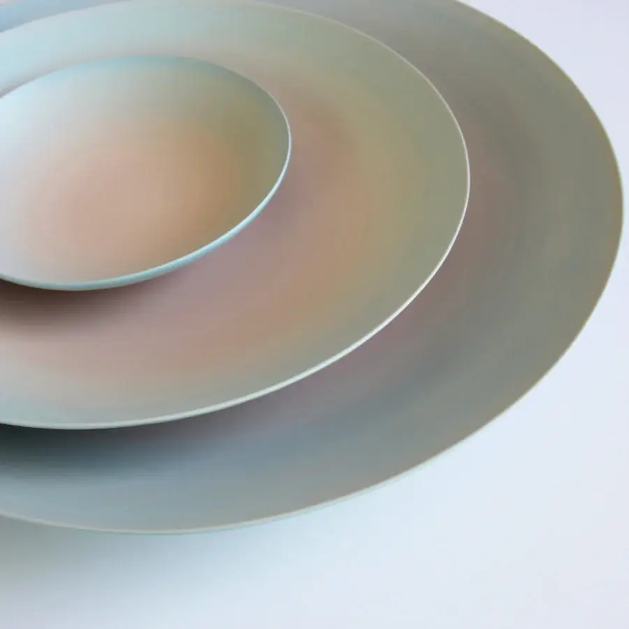 Distinguished Rina Menardi Gusci Shells centerpiece crafted in Italy with muted pale green-grey and soft peach-pink ceramic and matte finish