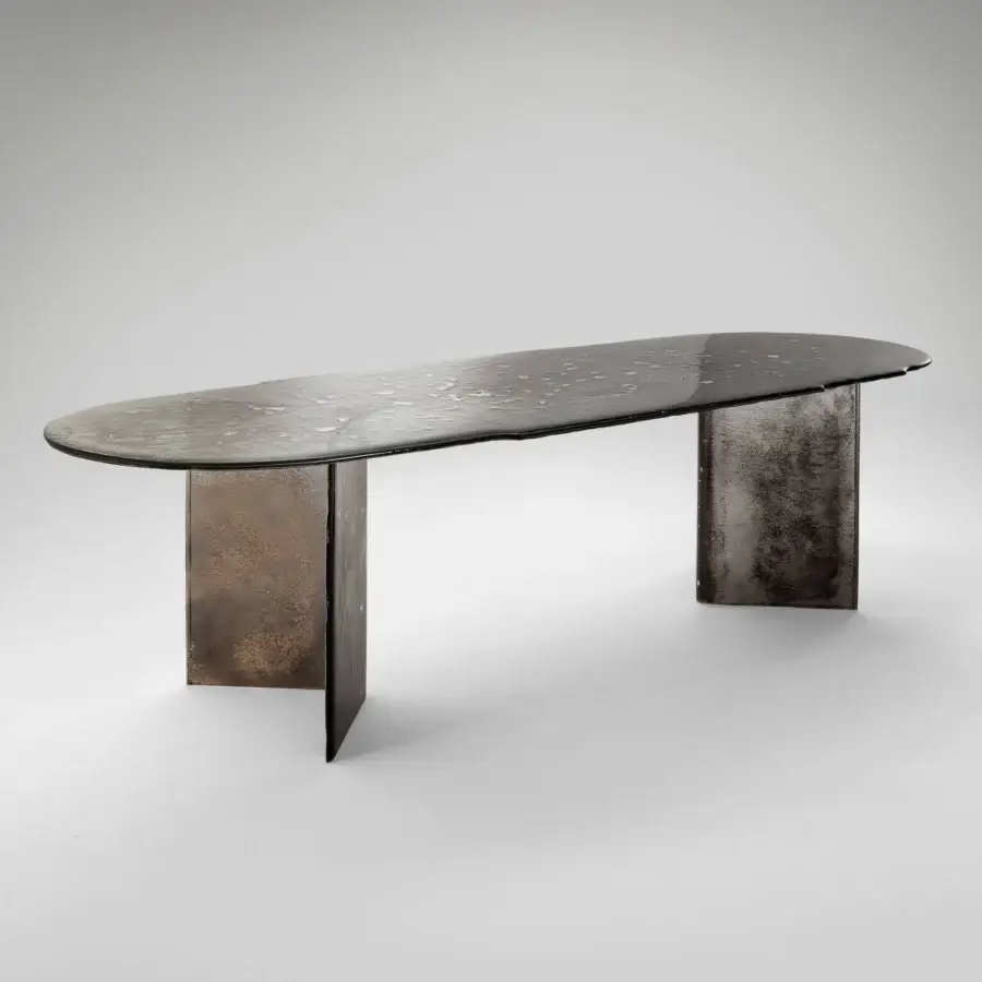Exceptional Arte Veneziana Bisatello table built with irregular baked glass exhibiting a silvered degradé finish and dark-toned metal bases